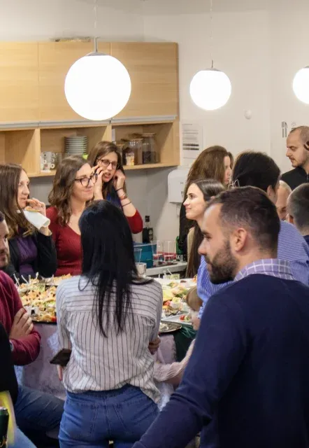 NS Drafter team sharing lunch in the office kitchen