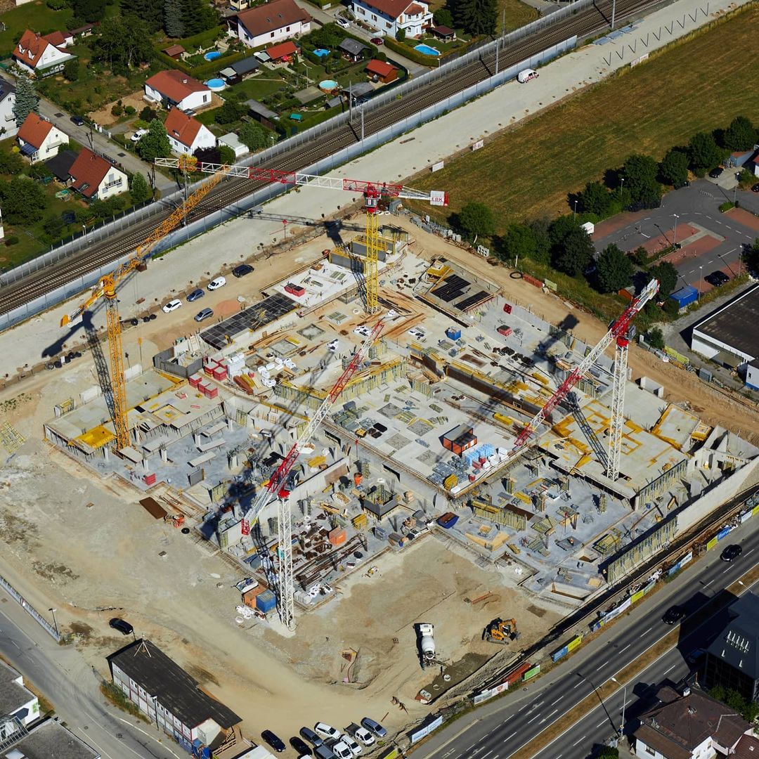 Aerial view of a large construction site in Graz, Austria, showing formwork and concrete structure layout in progress